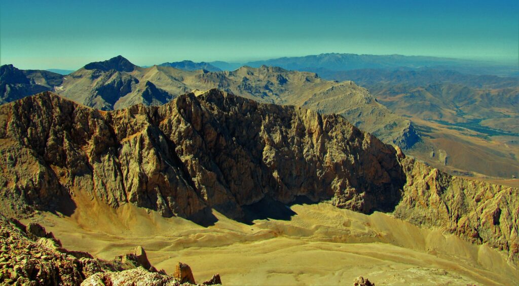 Backpacking in Turkey. Viewing a vast expanse of a desert mountain range in central Turkey from an elevation of approximately 12200 feet.