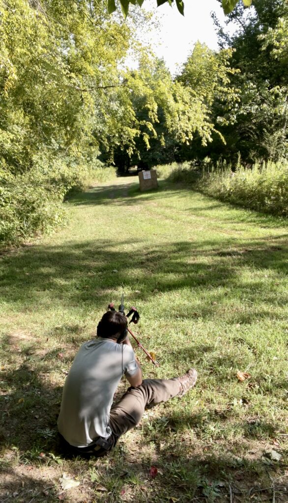 Practicing shooting in field positions in preparation for a mountain hunt in the frank church.