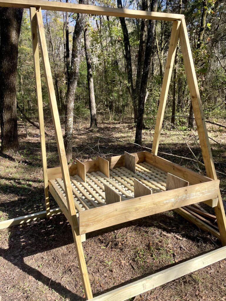 Heavy wooden lattice used for the floor of a chicken coop.